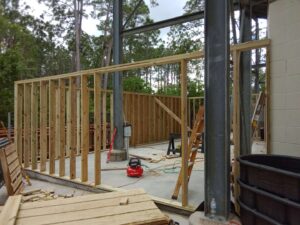 Built outbuilding with roll up door at the amphitheater image 1