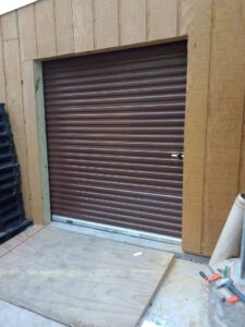 Built outbuilding with roll up door at the amphitheater image 2