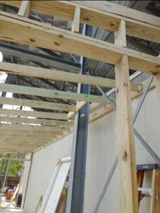 Built outbuilding with roll up door at the amphitheater image 4