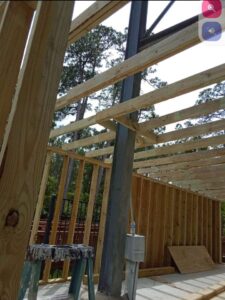 Built outbuilding with roll up door at the amphitheater image 5