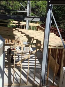 Built outbuilding with roll up door at the amphitheater image 7